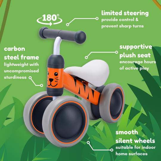 Children's balance bike with features highlighted on a green background such as limited safety sterring, carbon steel frame, supportive seat and smooth silent wheels