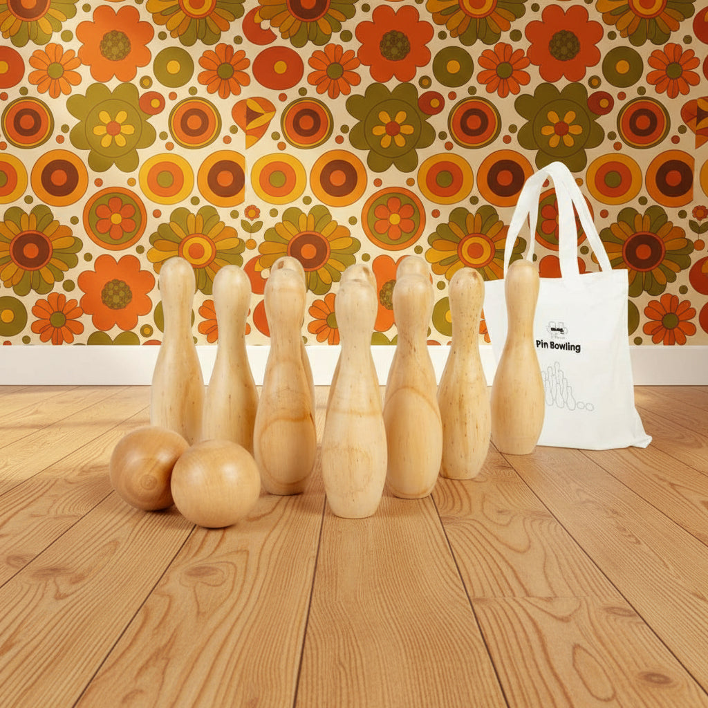 A wooden 10-pin bowling set with two balls and a tote bag, all displayed on a white background.