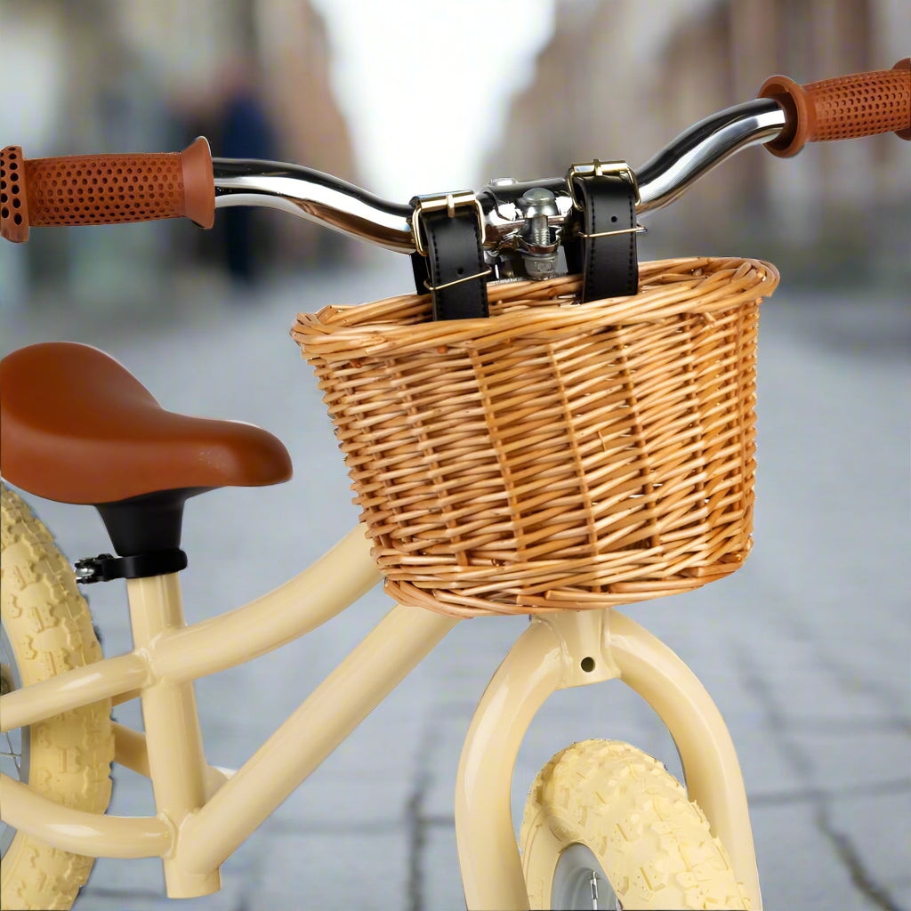 Close up of brown wicker basket on handlebar