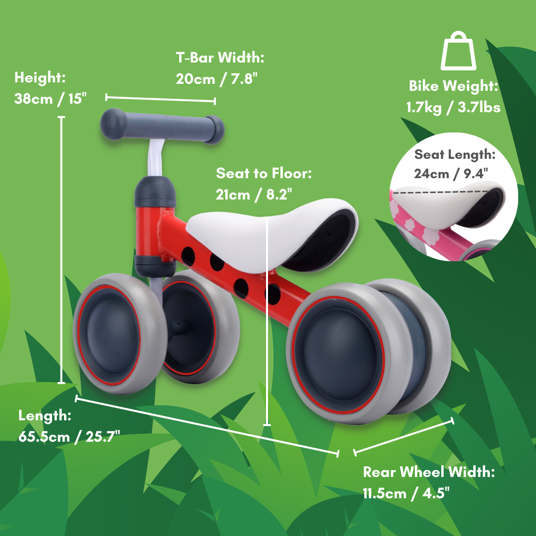 Red ladybird balance bike with measurements on a green leafy background