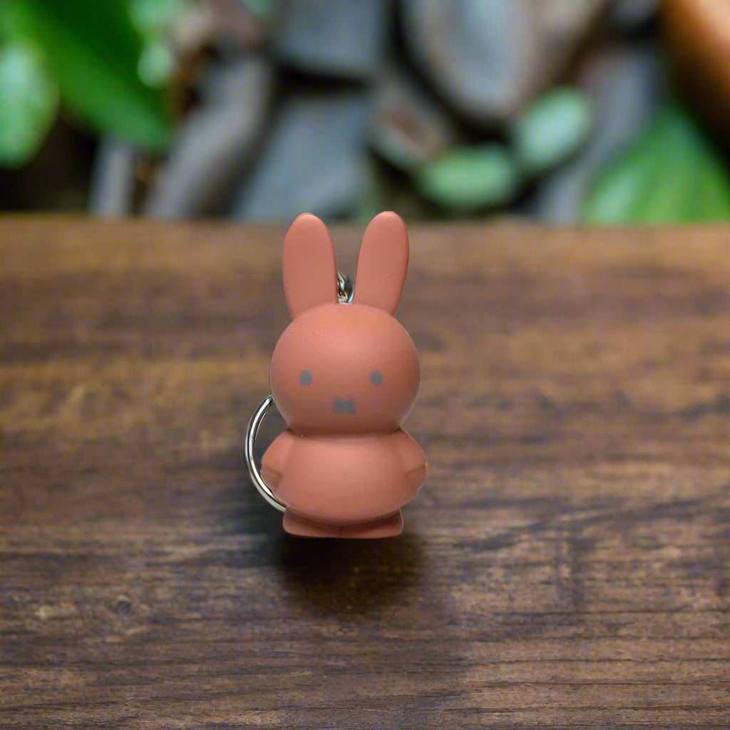 Small brown terracotta red coloured rabbit with iconic cross stitched mouth keyring