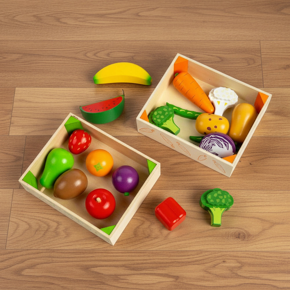 Set of wooden toy fruits and vegetables in two boxes on a white background