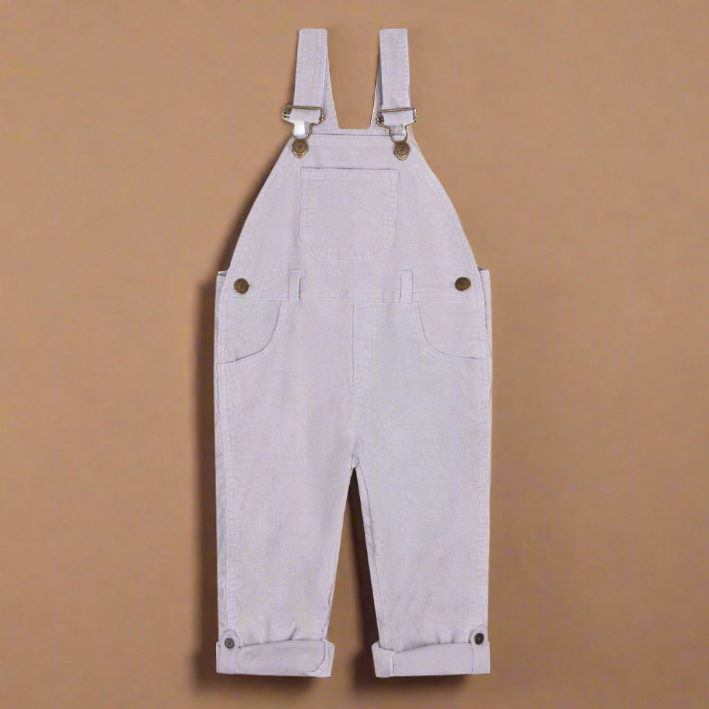 Very pale lilac corduroy dungarees with gold/brass coloured buttons