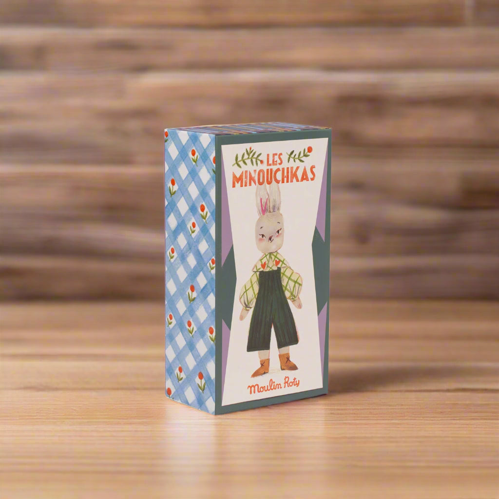 Product packaging with a cartoon rabbit character on a white background