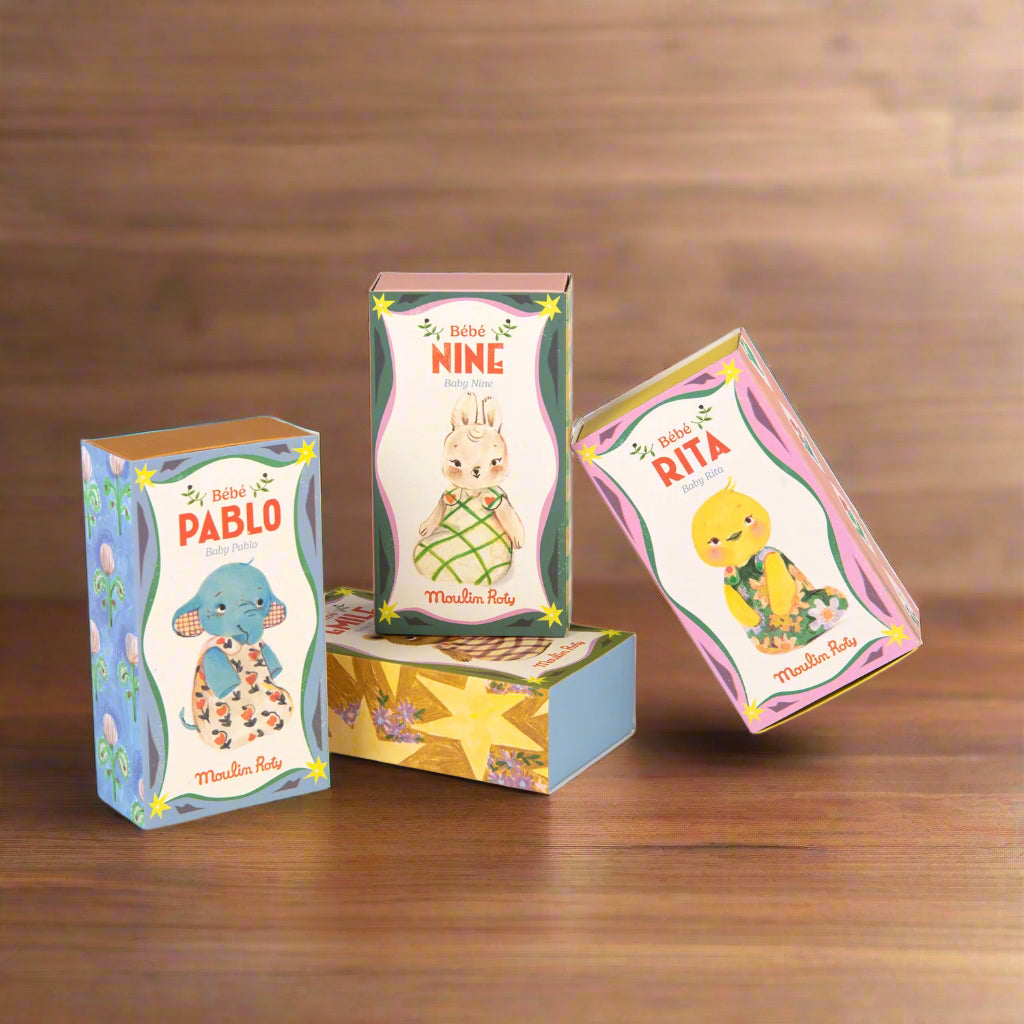 Three colourful boxes featuring cartoon characters named Pablo, Nine, and Rita on a white background.