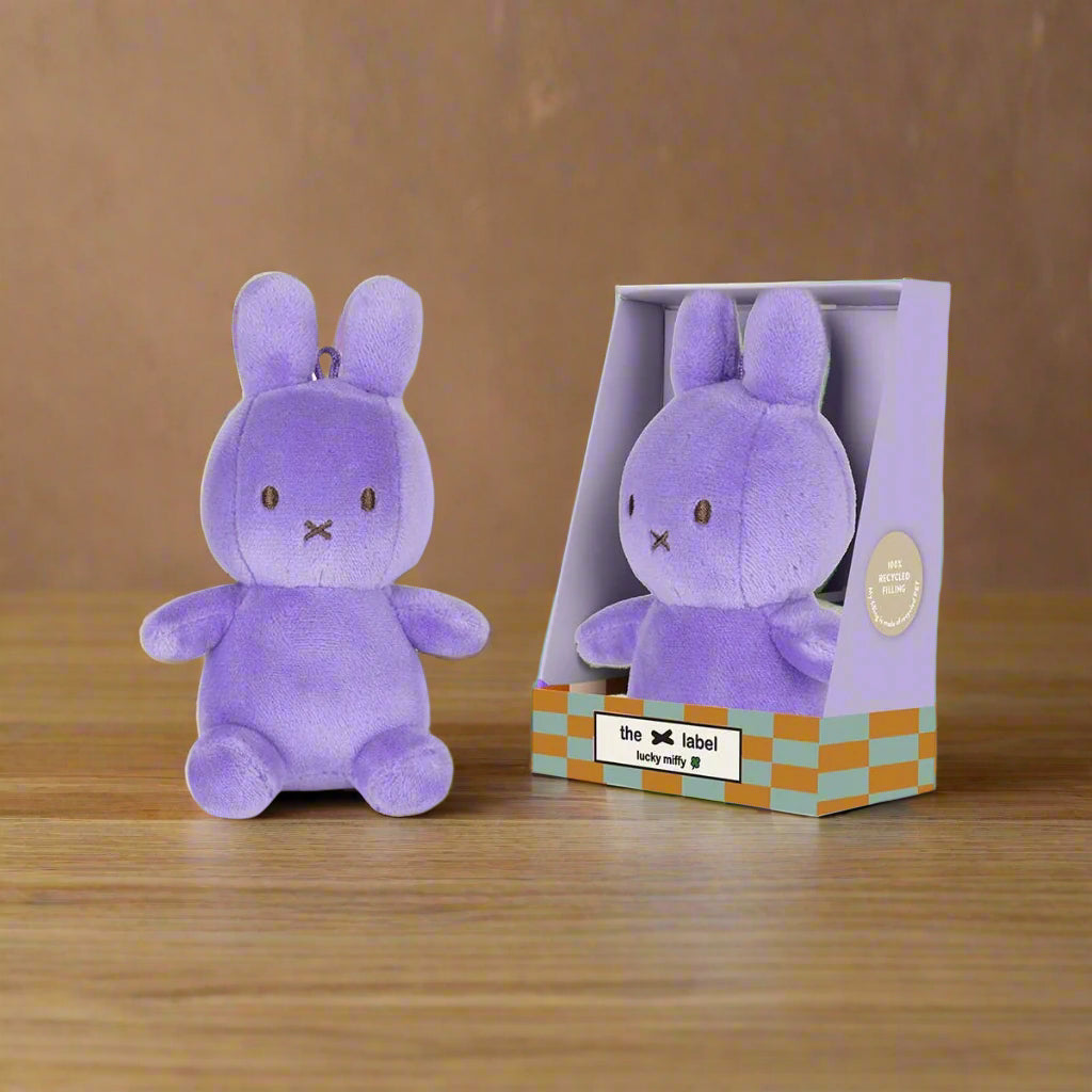 Lilac coloured plush stuffed toy rabbit with iconic cross stitched mouht in gift box