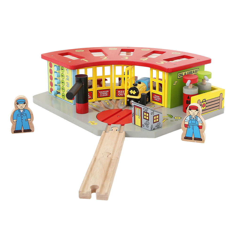 Colourful wooden engine shed with two wooden people figures and attached wooden train track piece