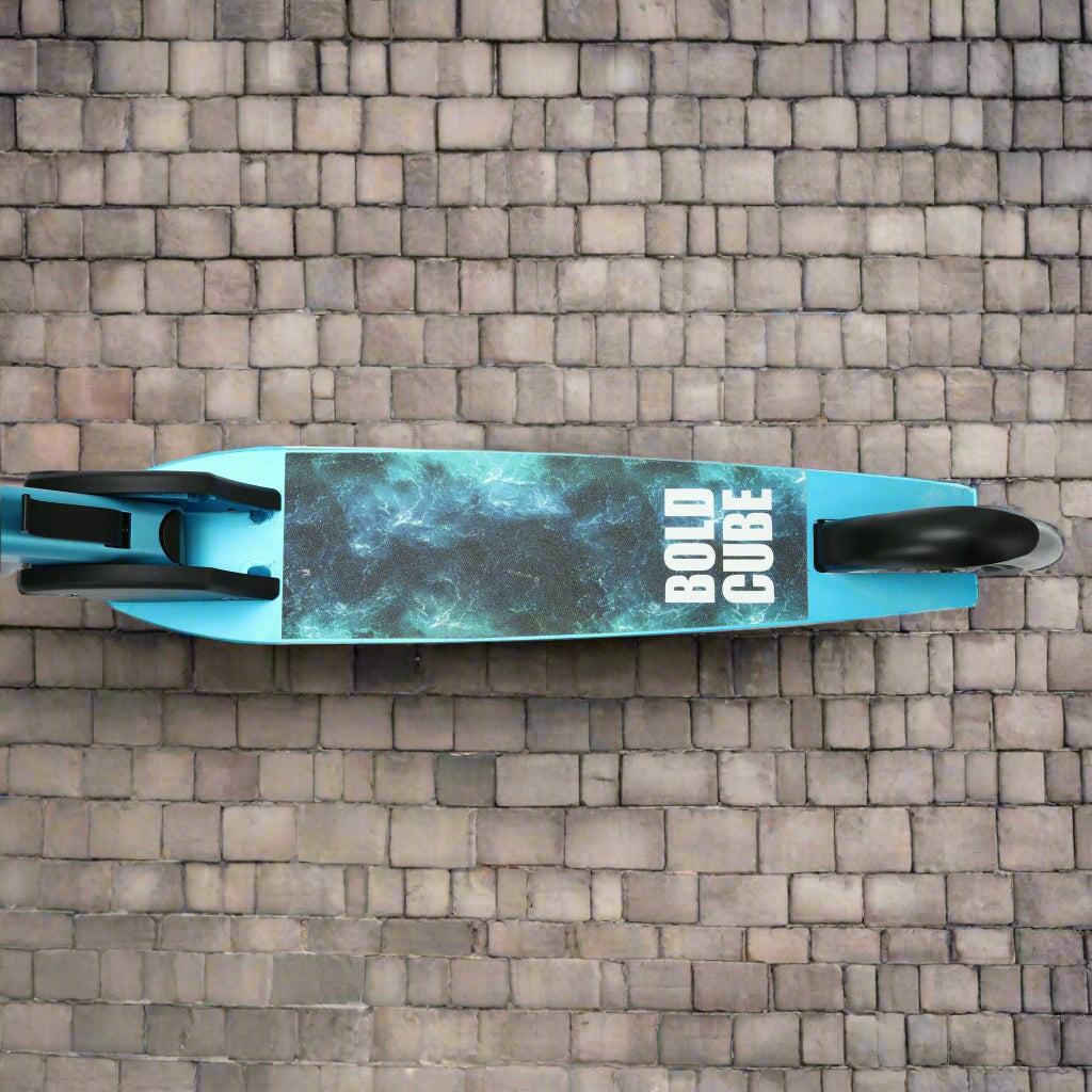 Blue scooter with 'Bold Cube' branding on a pavement