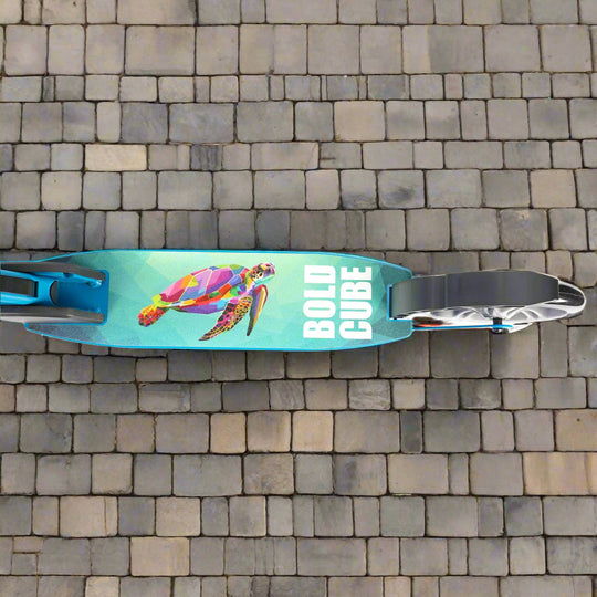Close up of the tread of the scooter shhowing a colourful turle swimming on a blue background and 'Bold Cube' written next to it