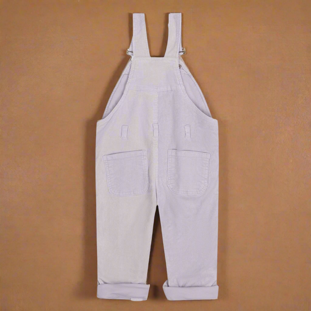 Light lilac corduroy dungarees from the back showing two pockets on the rear