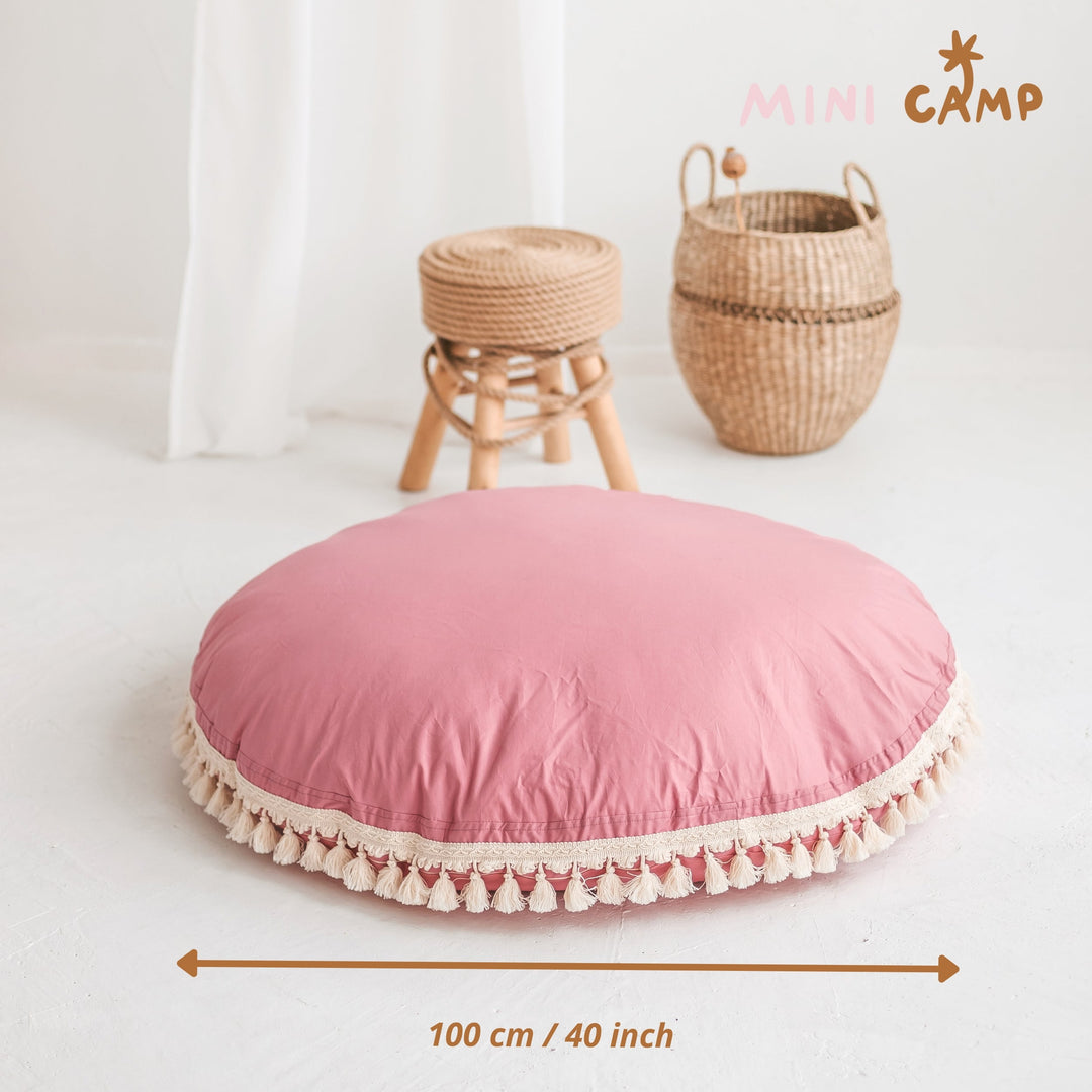 Pink round cushion with tassels with diameter measurements 100cm/40 inches