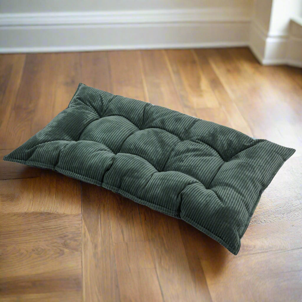 Large rectangular floor cushion with chunky striped corduroy fabric and buttons in a petrol green/blue colour
