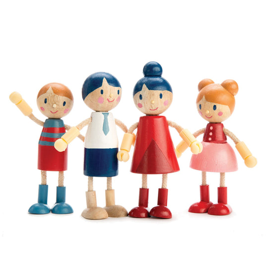 Set of four colourful wooden toy doll figures on a white background
