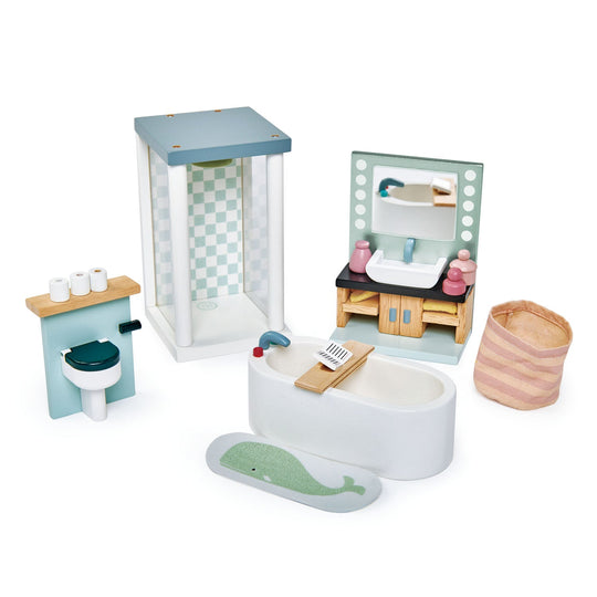 Toy bathroom set with bathtub, sink, and toilet on a white background