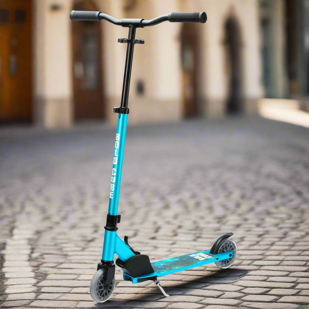 Blue scooter with an out of focus street in the background