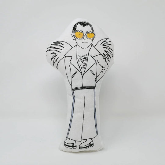 Decorative screen printed doll with a stylised illustration of a person wearing sunglasses and a jacket on a white background