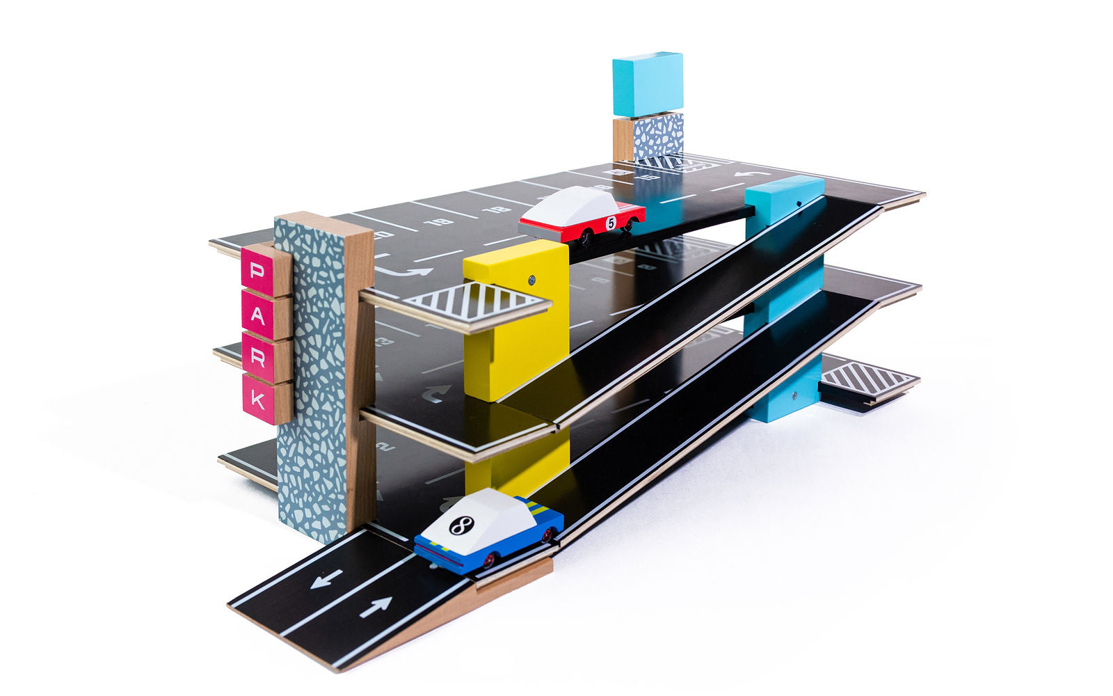A colourful Candylab Parking Garage made of wooden material with a multi-level design and several toy cars parked in designated spots.