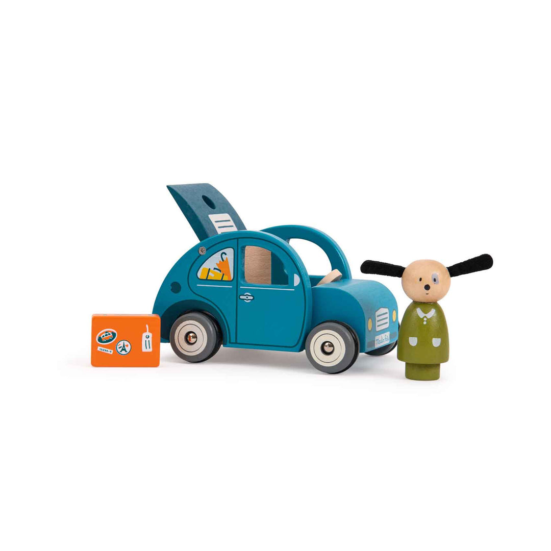 Wooden blue car with open boot, small suitcase, and figurine on a white background