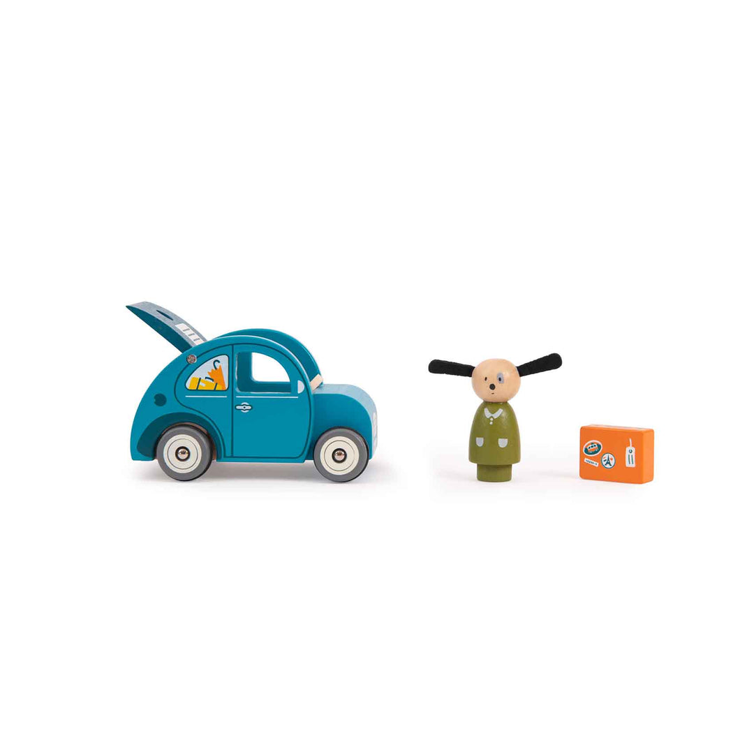 Another image of the car with the boot open, the figure and the suitcase