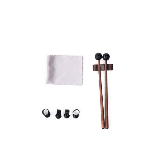 Pair of drumsticks on a stand,cleaning cloth and finger tip accessories