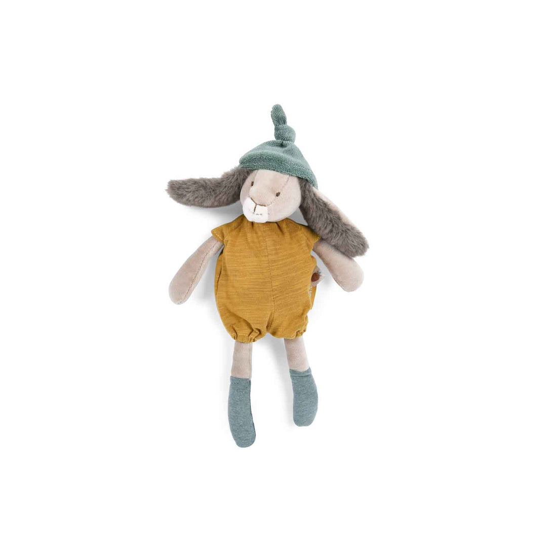 Stuffed toy rabbit wearing a mustard yellow romper and green hat with grey fluffle ears coming out under the hat