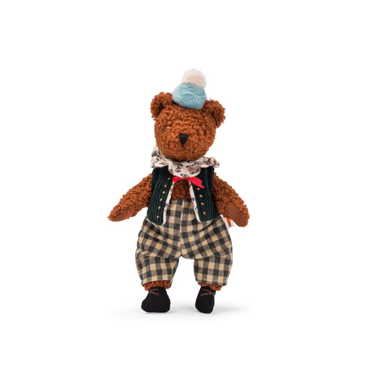 Stuffed brown teddy bear with teddy fabric wearing a neck tie, hat, corduroy waistcoat and checkered trousers