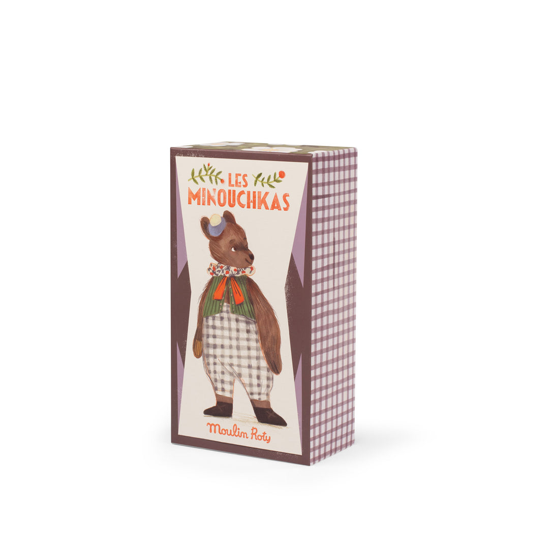 Product packaging with a bear illustration and text on a white background