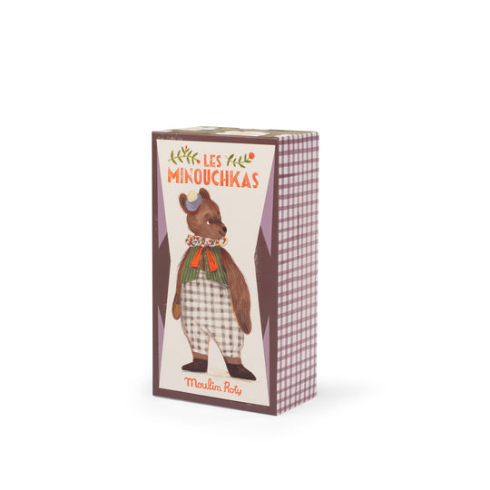 Product packaging with a bear illustration and text on a white background