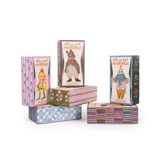 Set of colourful boxes with cartoon characters, showing the other characters in the range