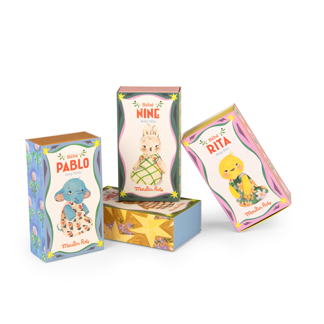 Three colourful boxes featuring cartoon characters named Pablo, Nine, and Rita on a white background.