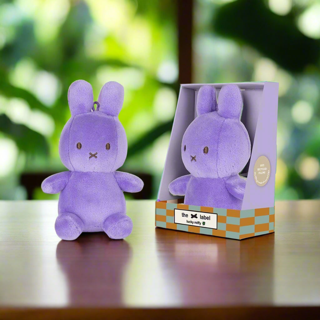 Lilac coloured plush stuffed toy rabbit with iconic cross stitched mouht in gift box