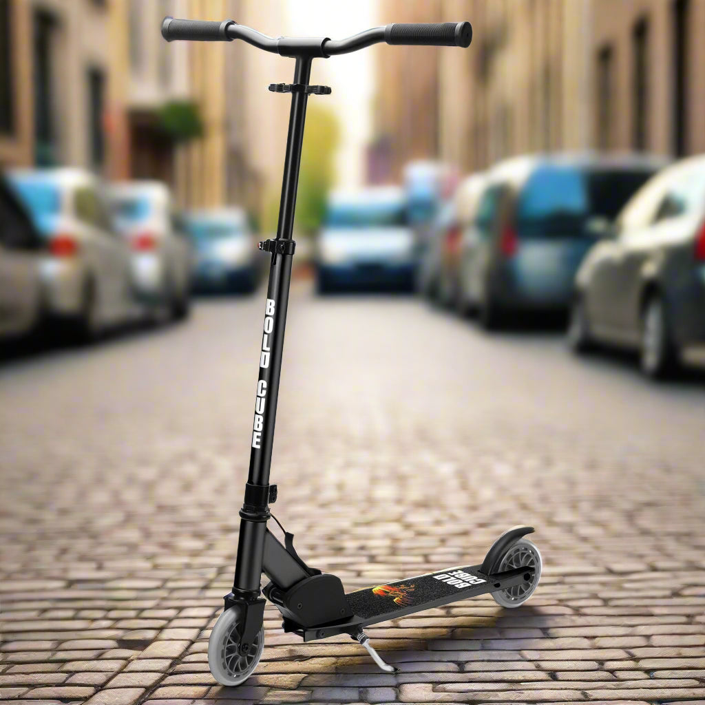 A black two-wheel scooter with a foldable handlebar and deck, designed for older children.
