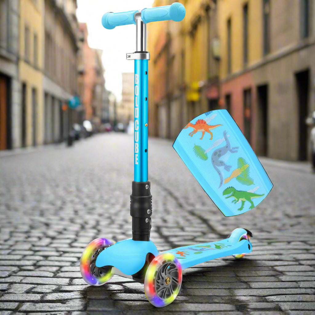 Children's scooter with colorful wheels and dinosaur design on a white background