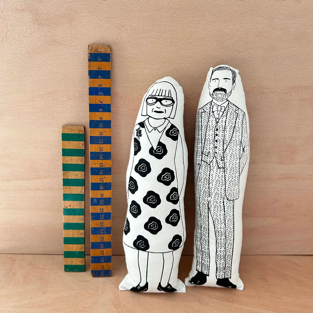 Two screen printed doll cushions, one of fashion designer and TV presenter Partick Grant, and the other of his co-presenter on the Great British Sewing Bee - Esme Young