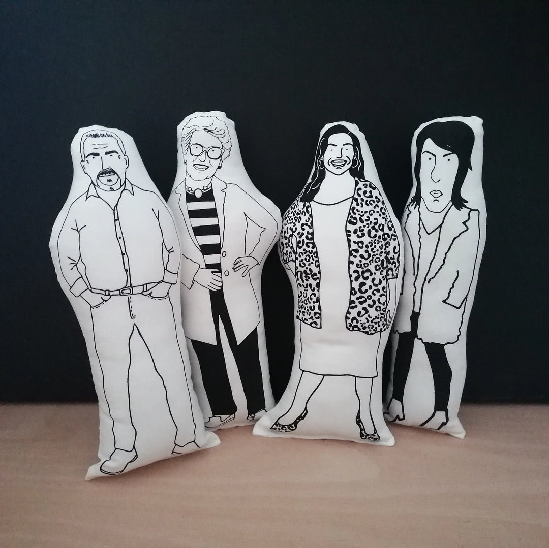 Four screen printed cushions of the Bake Off presenters - Paul Hollywood, Prue Leith, Allison Hammond and Noel Fielding
