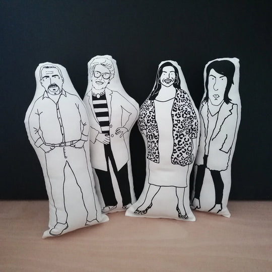 Four screen printed cushions of the Bake Off presenters - Paul Hollywood, Prue Leith, Allison Hammond and Noel Fielding