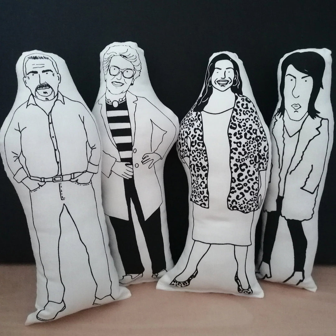 Four screen printed cushions of the Bake Off presenters - Paul Hollywood, Prue Leith, Allison Hammond and Noel Fielding