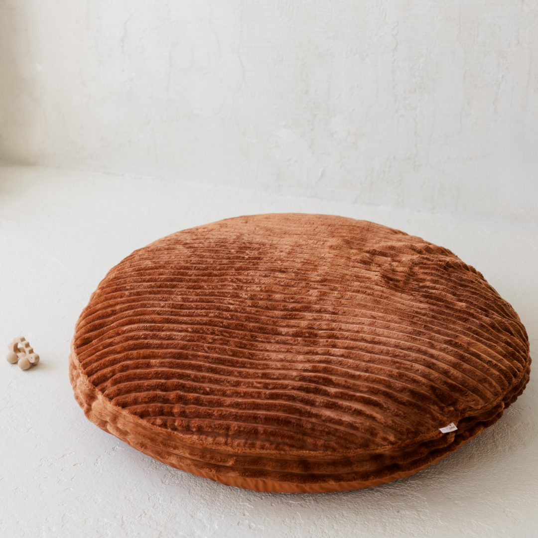 MINICAMP Large Kids Floor Cushion with a terracotta corduroy cover