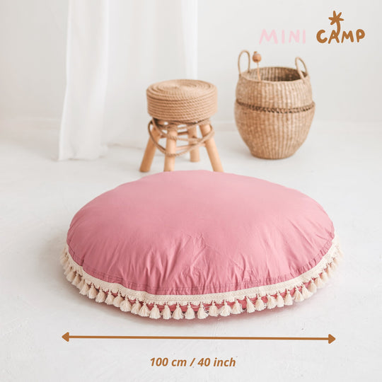 Pink round cushion with tassels with diameter measurements 100cm/40 inches