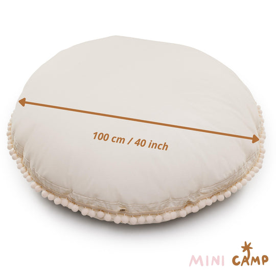 Round white cushion with measurement text showing that the diameter of the cushion is 100cm/40 inches
