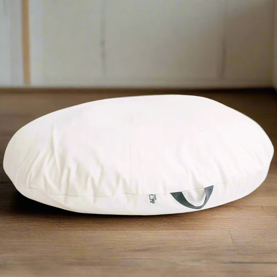 White round floor cushion with grey loop handle