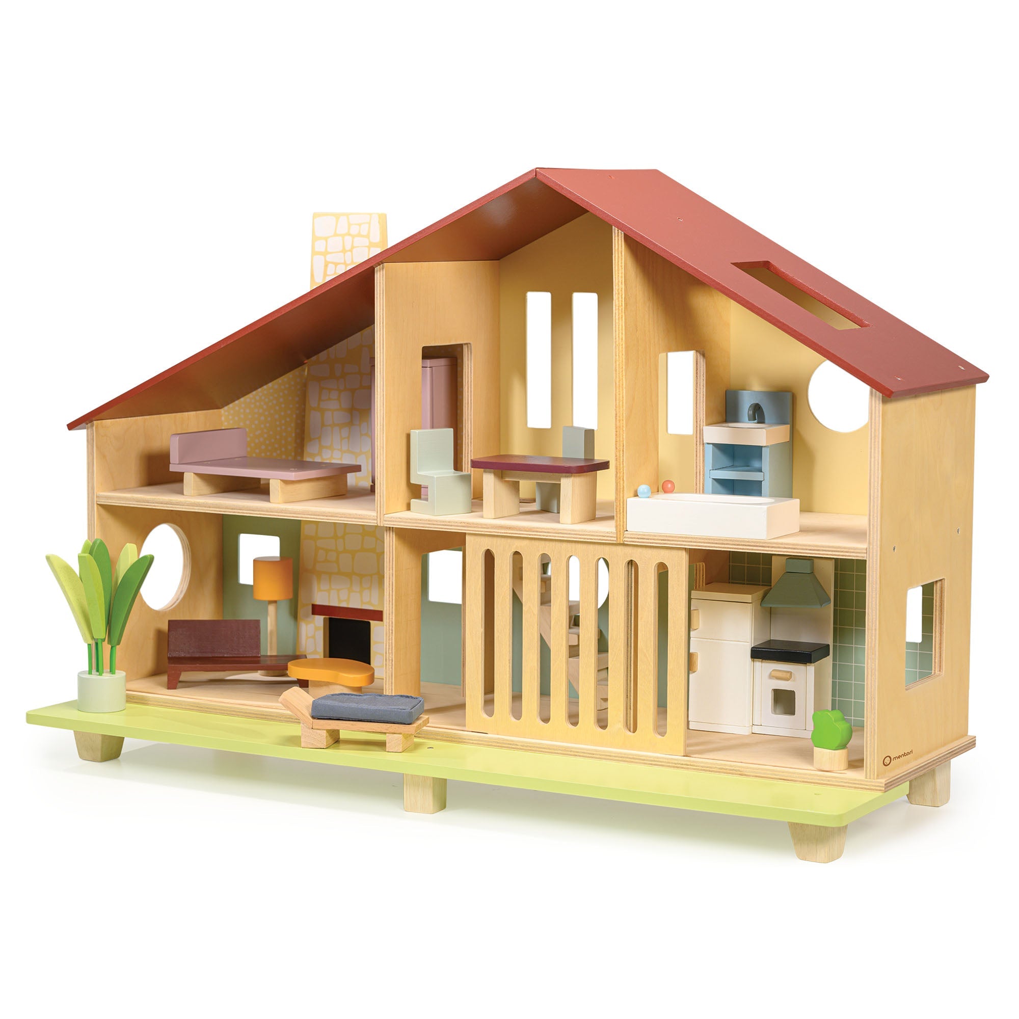 Wooden dollhouse with furniture and accessories on a white background