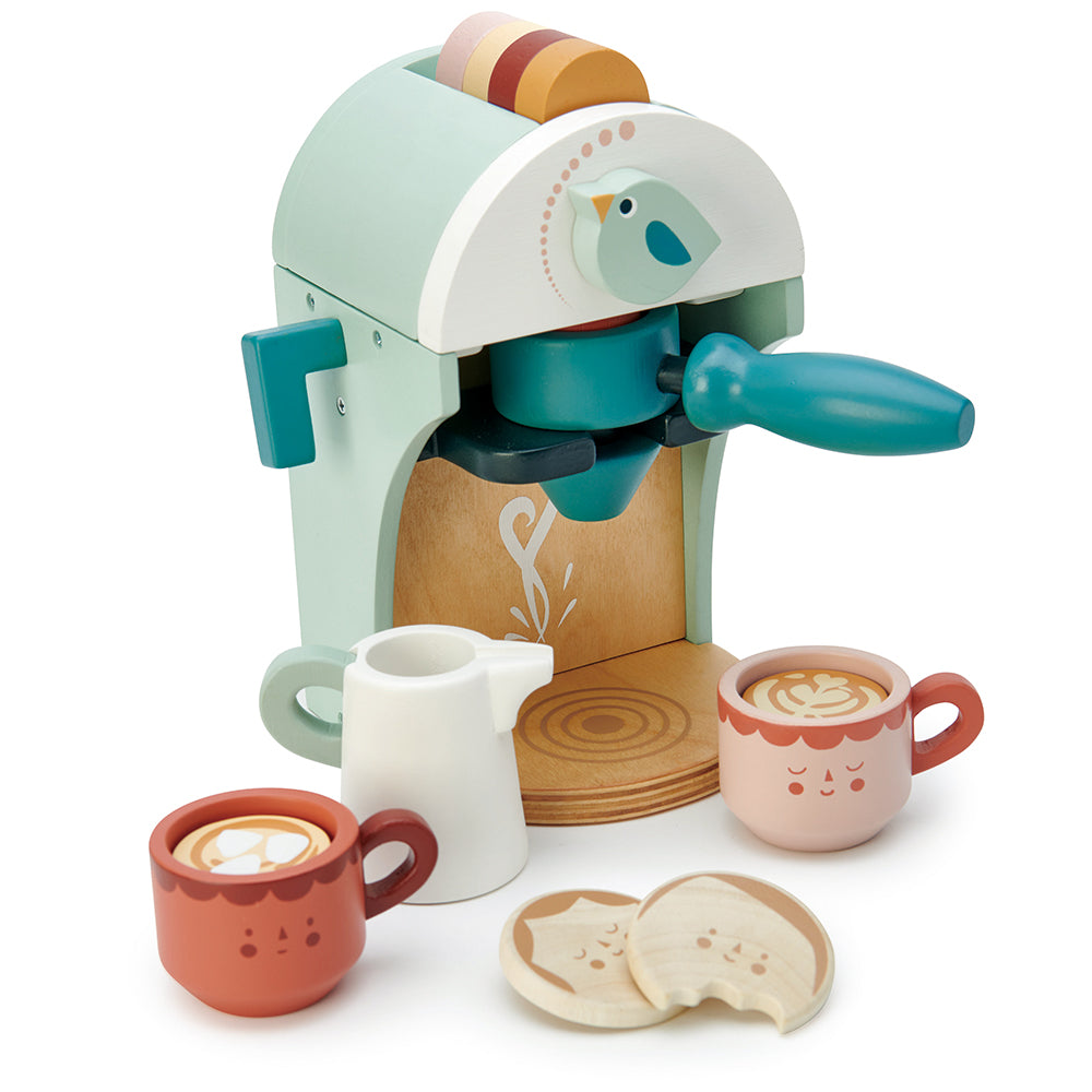 Toy espresso machine with cups and accessories on a white background