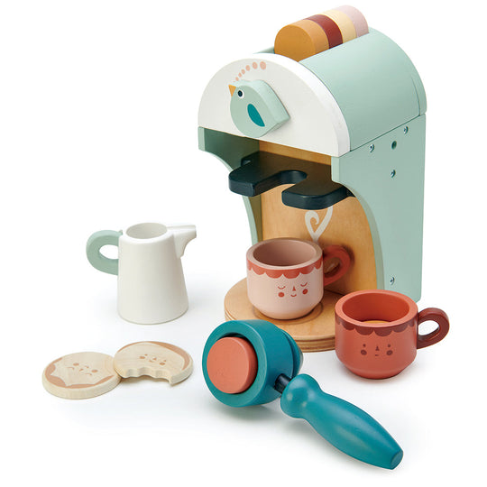 Toy coffee machine set with cups and a grinder on a white background