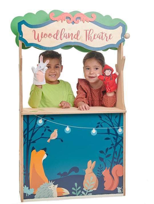 Children playing with a 'Woodland Theatre' toy set, featuring animals and a forest design.