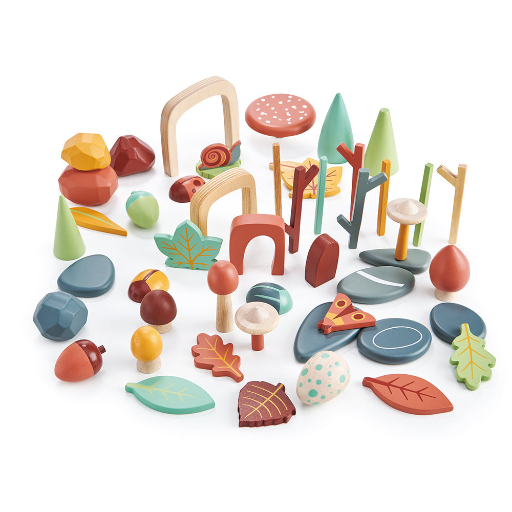 Set of colourful wooden toys on a white background