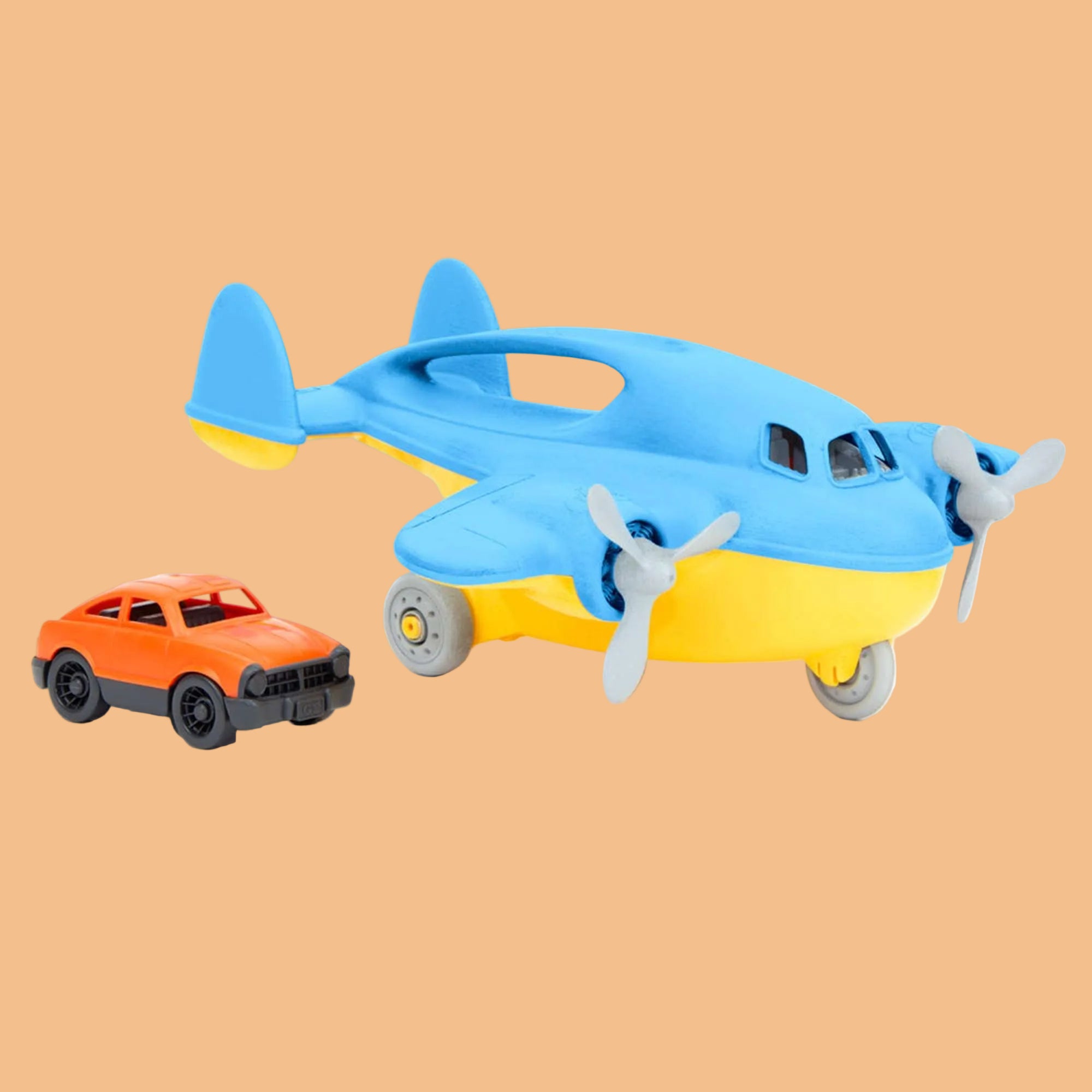 Toy airplane and car on a white background