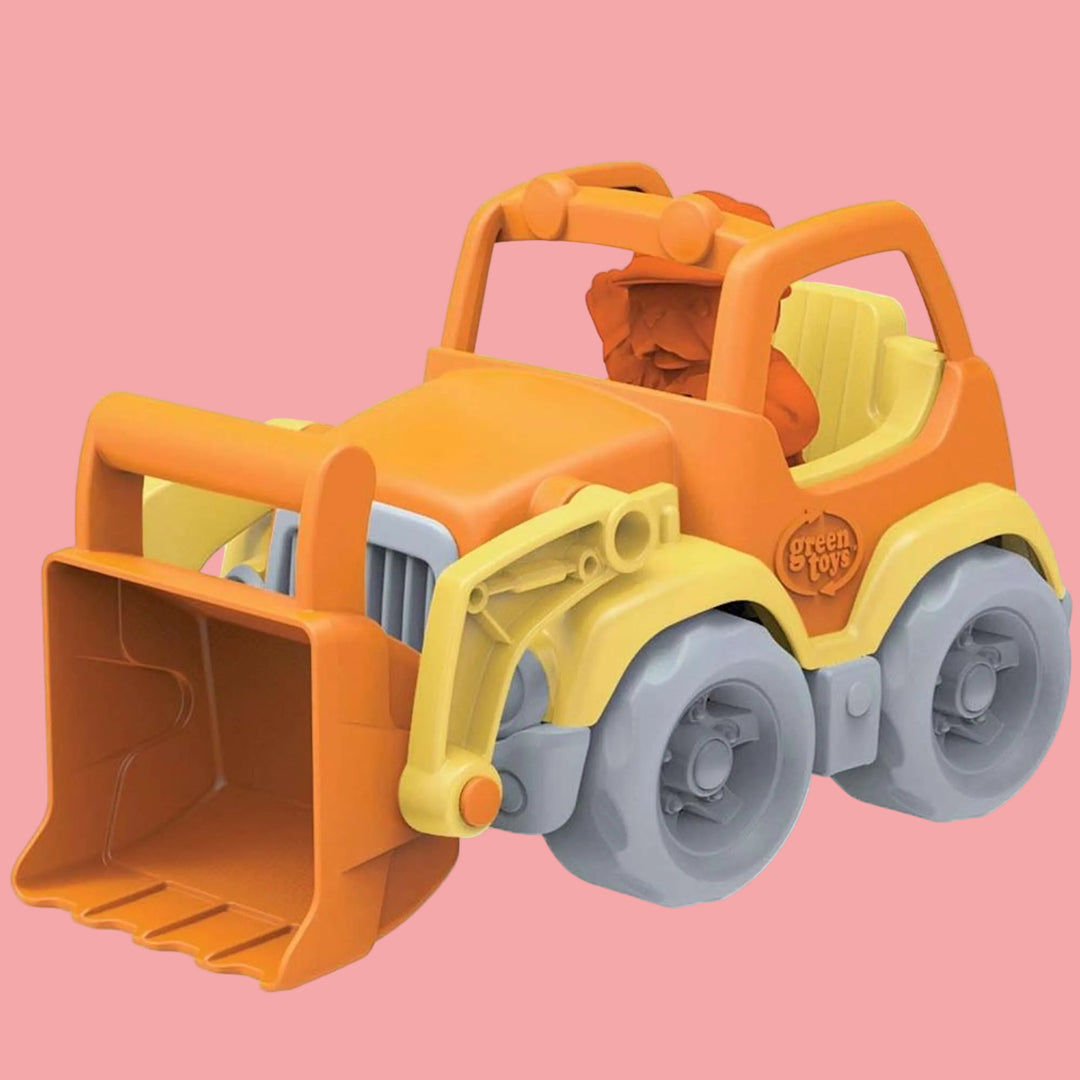 Toy bulldozer with orange and yellow colors on a white background