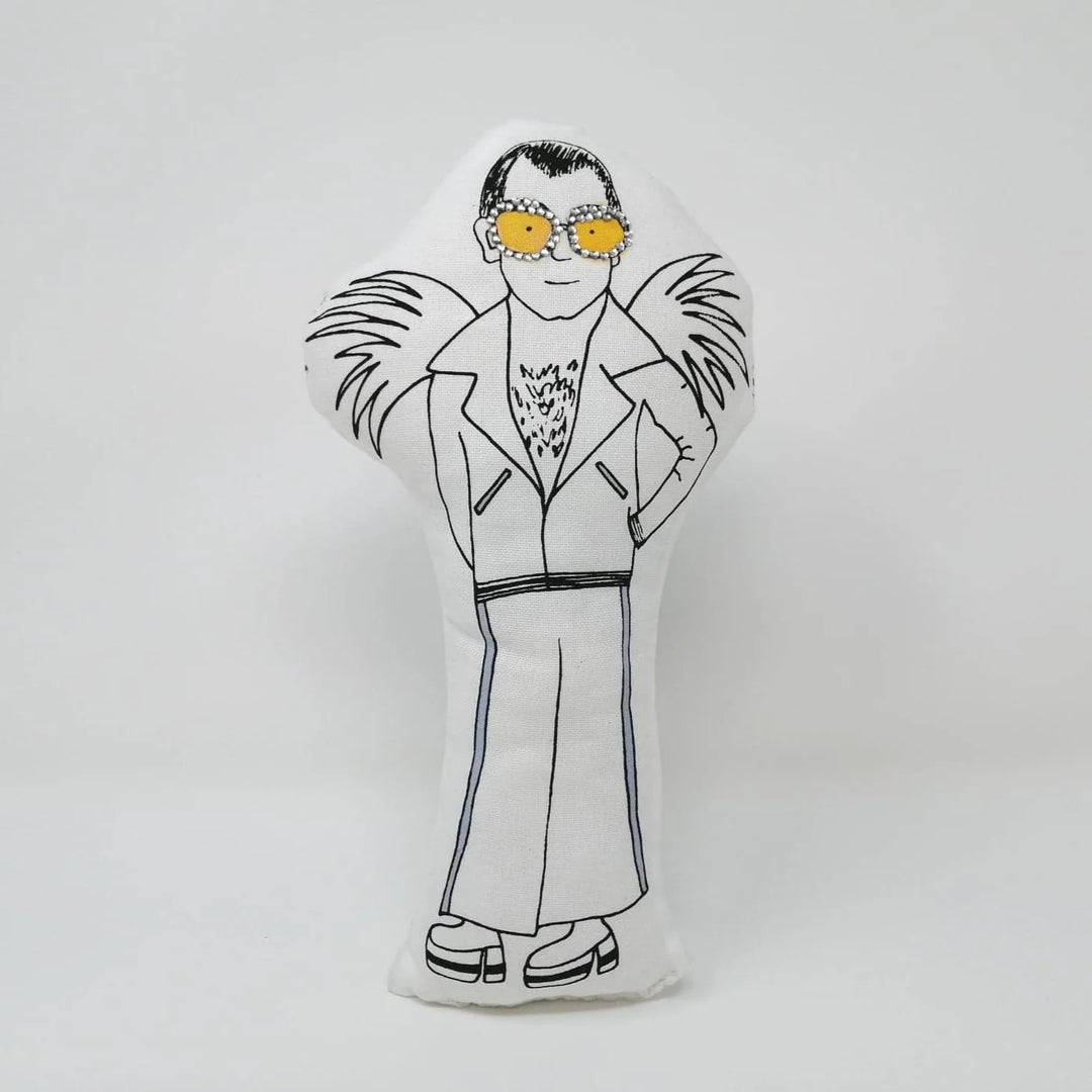 Decorative screen printed doll with a stylised illustration of a person wearing sunglasses and a jacket on a white background