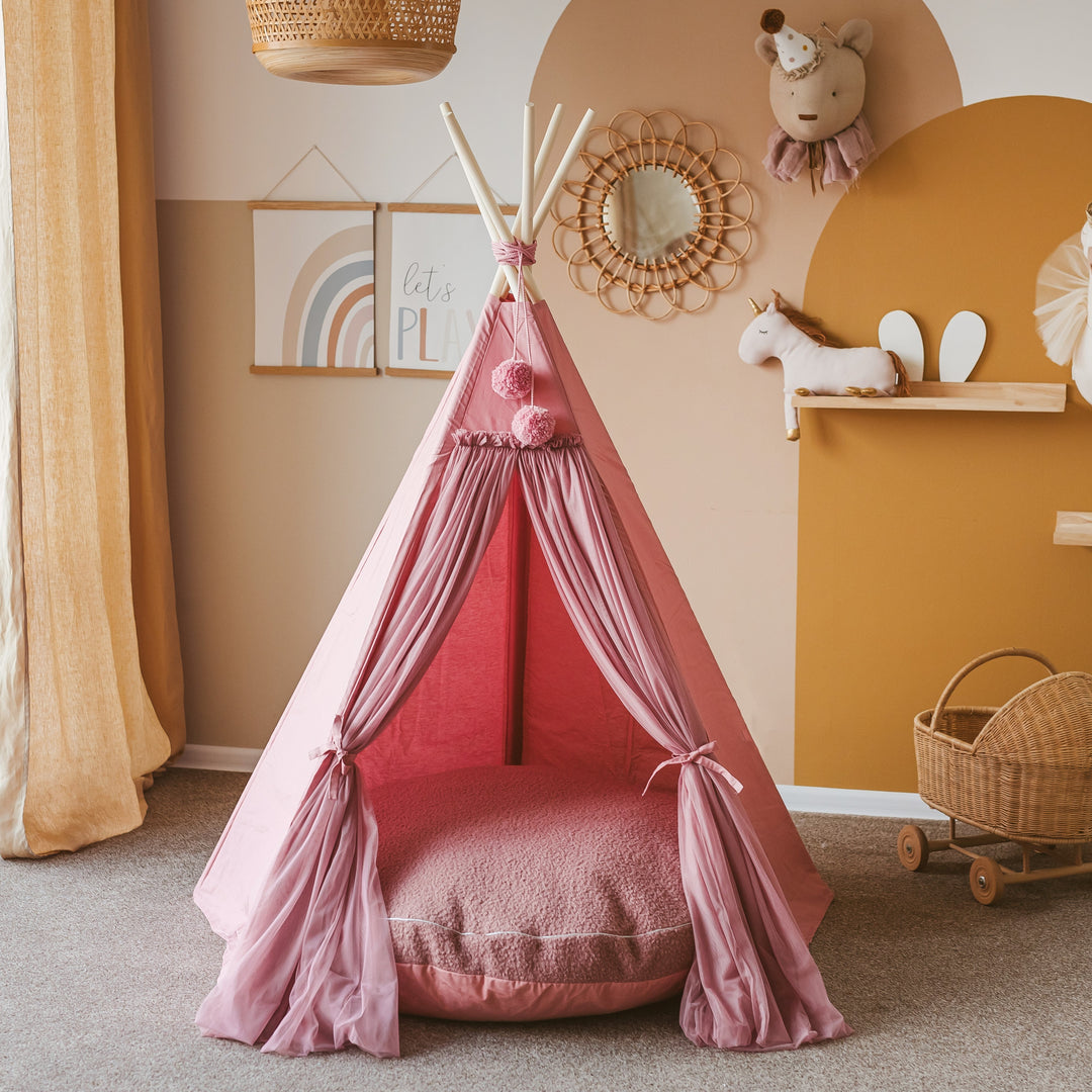 Pink children's teepee tent with matching colour large round floor cushion inside